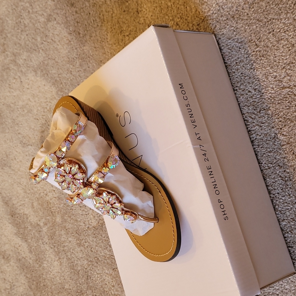 Rose gold small heel sandals.